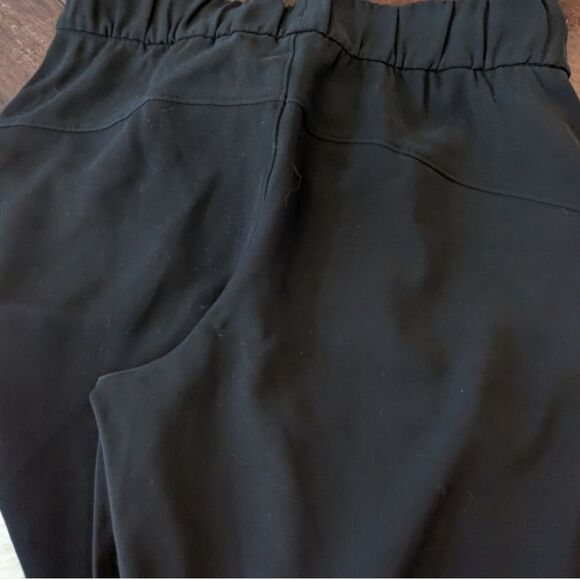Lululemon On The Fly Pant 27" Black 4 - Picture 2 of 11